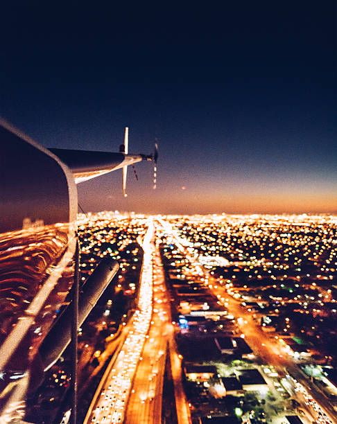 istock helicopter flying at dusk in miami 638713862