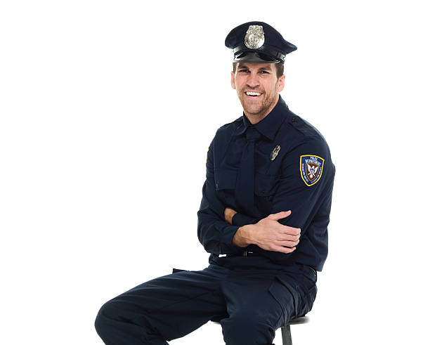 istock Smiling police sitting on stool 638714412