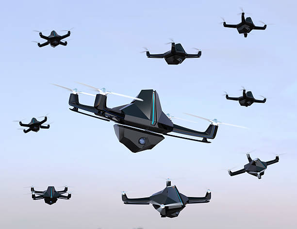 istock Swarm of drones flying in the sky 638714654