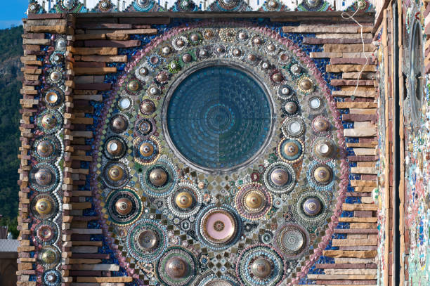 istock Hand made circular mosaic on Thai Buddhist Temple wall. 638714888