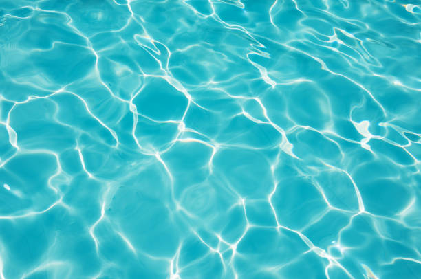 istock Blue water surface in swimming pool 638716646