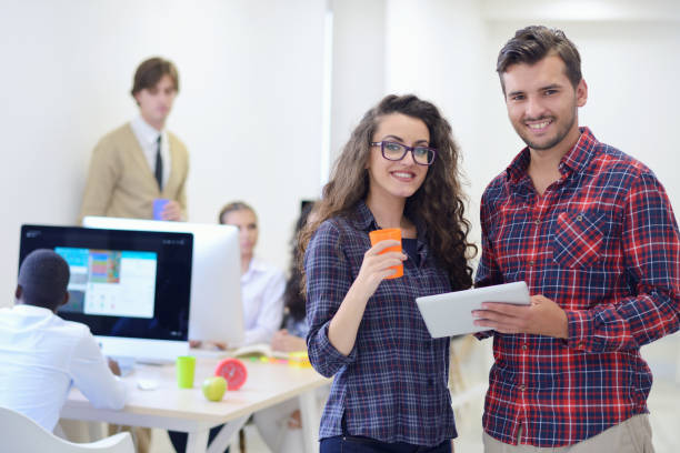 istock young startup business people, couple working on tablet computer 638717734