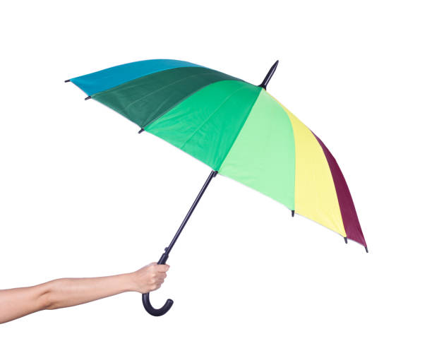 istock hand holding multicolored umbrella isolated on white 638718874