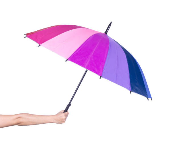 istock hand holding multicolored umbrella isolated on white 638718886