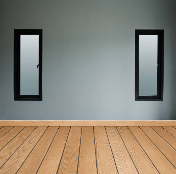 Empty room corner with white walls and ceiling and brown hardwood parquet floor and soft light, simple minimalist interior architecture background with copy-space, 3d illustration