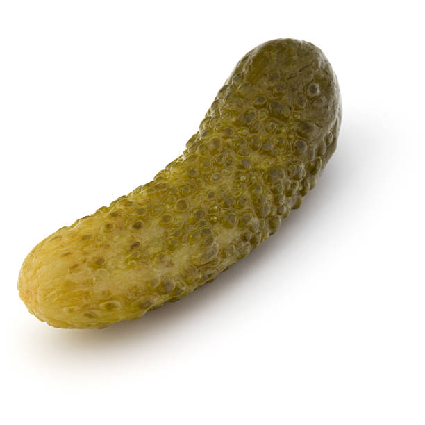 istock pickled or marinated  cucumber isolated on white background 638722870