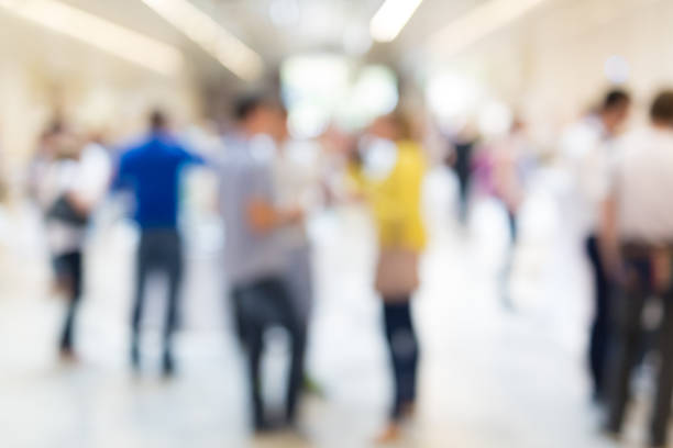 istock Abstract blurred people socializing during coffee break at business conference. 638724928