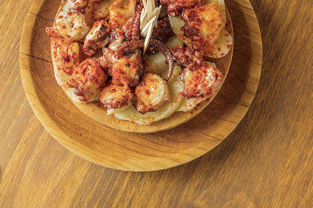 istock Photo of octopus with potatoes, typical Spanish dish 638727756