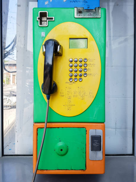 istock Old public phone coin , Thailand 638728016