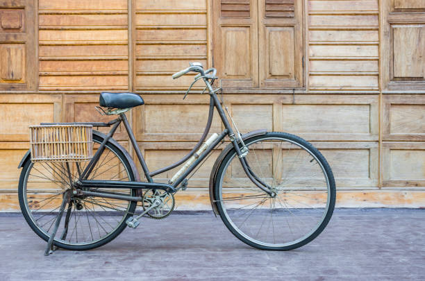 istock Vintage bcycle standing near wood wall 638728310