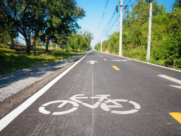 istock White bicycle sign and symbol on bicycle lane 638733890