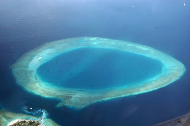 istock Atoll Island seen from above as a blue eye 638734046