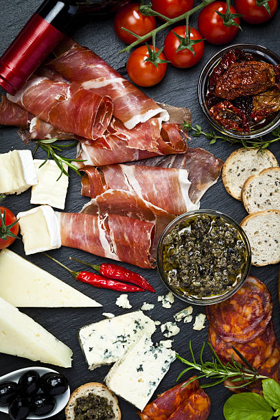 istock Delicious appetizers on dark slate table 638734132
