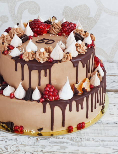 istock Festive two-tier cake with fruit streaks of chocolate 638737134
