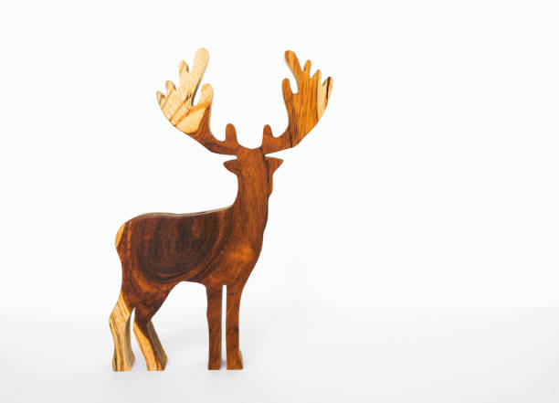 istock Wooden reindeer on white background 638737322