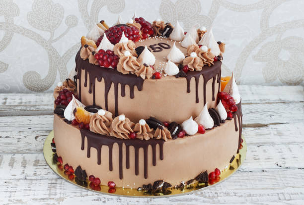 istock Festive two-tier cake with fruit streaks of chocolate 638738988