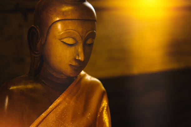 istock close up face on buddha head statue . 638744814
