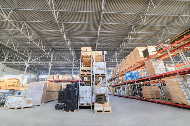 istock Long shelves with a variety of boxes and containers. 638745128