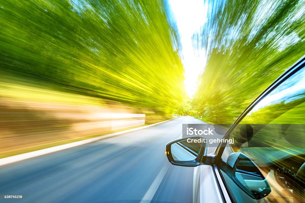 Driving on the road Driving on a beautiful spring day.  Car Stock Photo