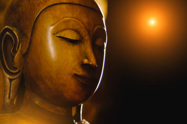 istock close up face on buddha head statue . 638745444