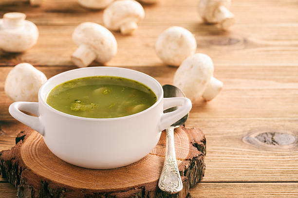 istock Vegetable soup with spinach, carrot and mushrooms. 638746088