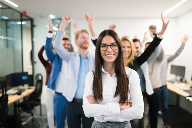Group of successful business people happy in office Portrait of group of successful businesspeople happy at work foreman stock pictures, royalty-free photos & images