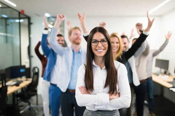 group of successful business people happy in office - foreman manager built structure expressing positivity imagens e fotografias de stock