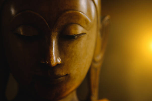 istock close up face on buddha head statue . 638748570