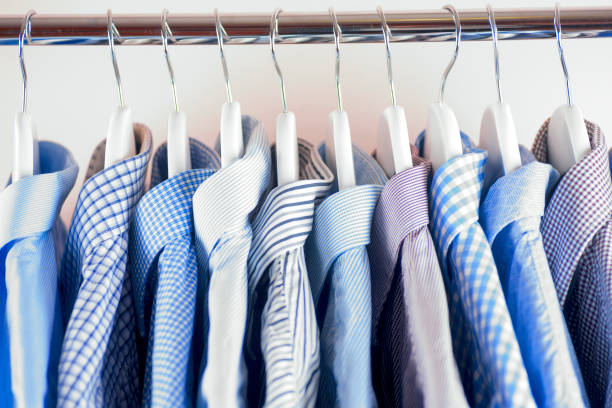 istock Cloth Hangers with Shirts. Men's clothes 638749104