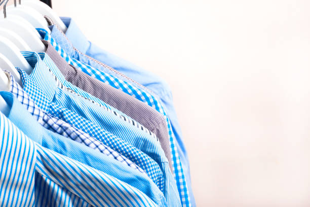 istock Cloth Hangers with Shirts. Men's clothes 638750504