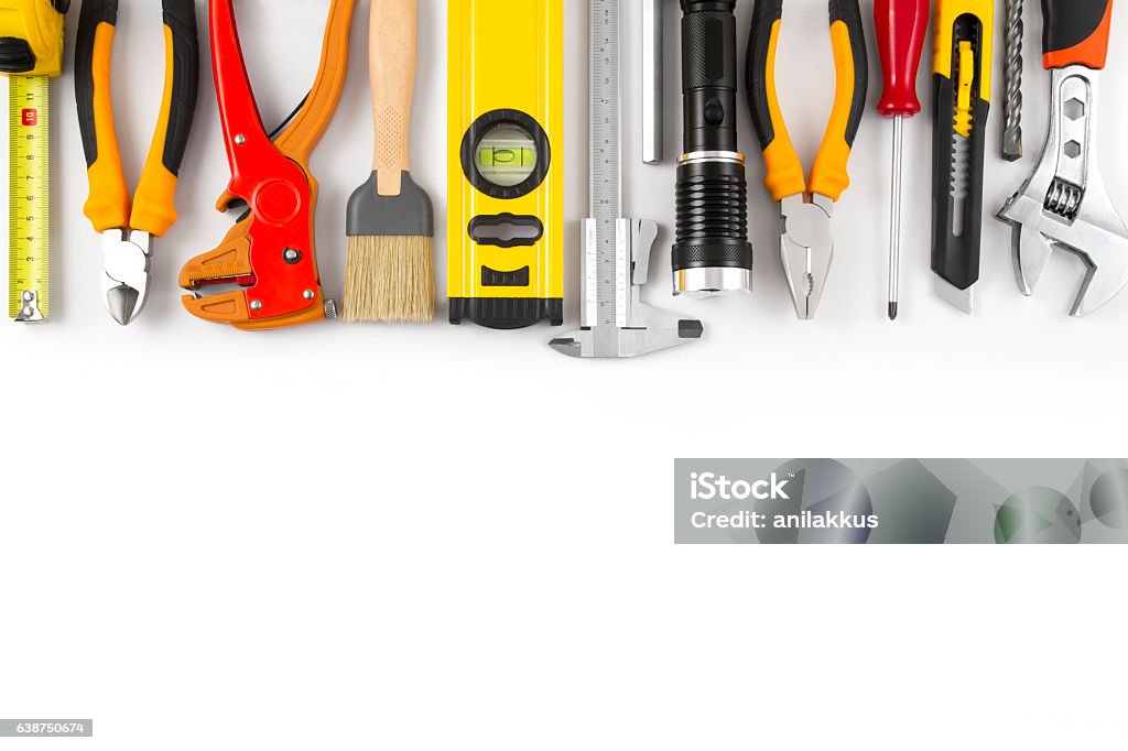 Work Tools on Isolated White Background Different kind of construction tools on white background with copy space. Work Tool Stock Photo