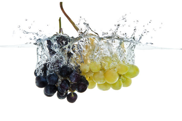 istock grapes fruits making splash in water 638750898