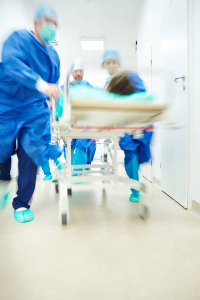 istock Doctors running to the operating room 638751468
