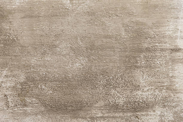 istock Shades of beige colored grained stucco 638751840