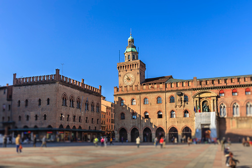 Piazza Maggiore is the main square of Bologna, surrounded by the most important buildings of the medieval city. Emilia Romagna, Italy. (selective focus)
