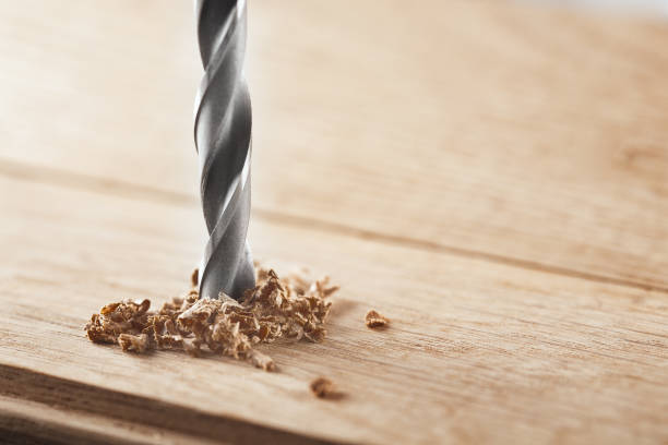 istock metal drill bit make holes in wooden oaks plank 638754334