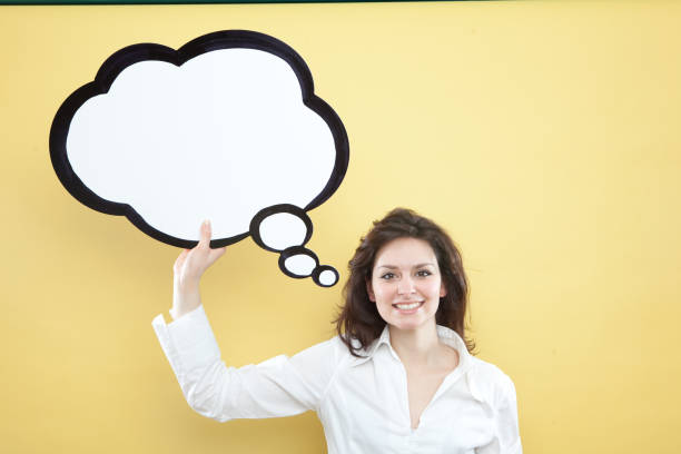 istock pretty young brunette caucasian woman thinking ideas with comic baloon 638757876