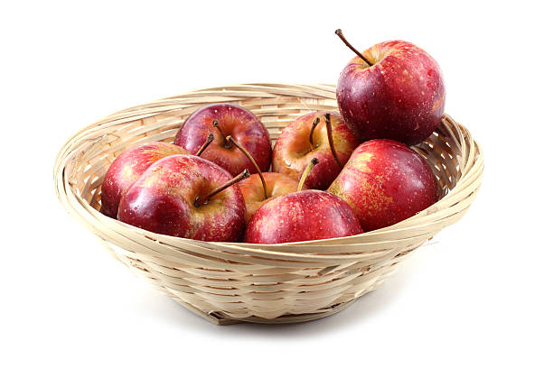 istock Red little apples on wicked plate 638758966