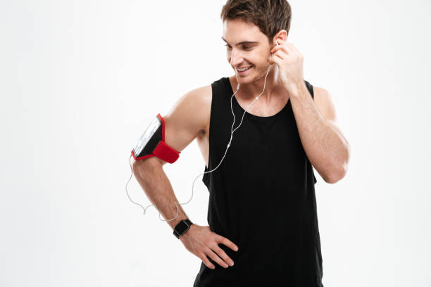 istock Cheerful young man listening music. 638759352