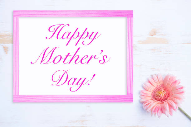 istock pink flower with frame and words Happy Mothers Day 638761198