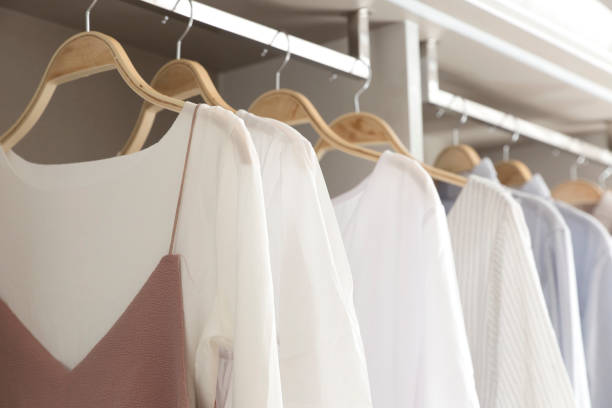 istock Female clothes on hangers in wardrobe 638761840