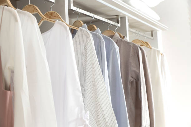 istock Female clothes on hangers in wardrobe 638761918