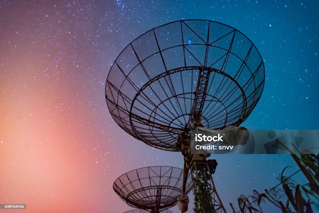 Radio telescope scene at night in China Satellite Stock Photo