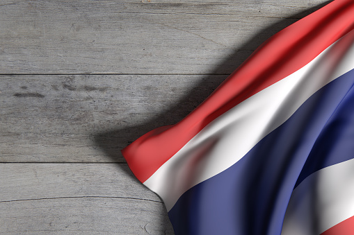 3d rendering of Thailand flag waving on wooden background