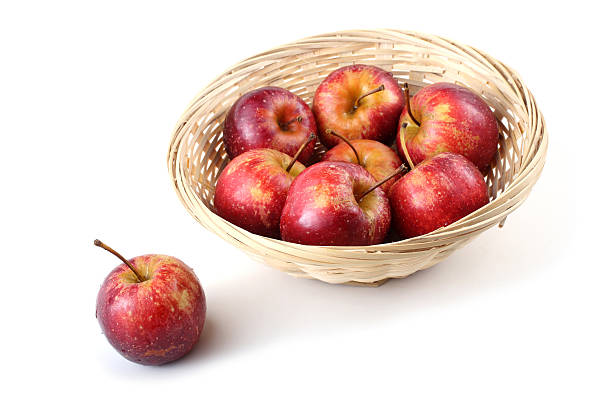 istock Red little apples on wicked plate 638767260