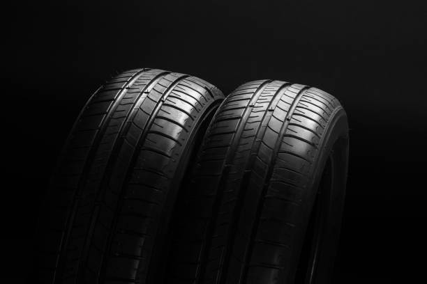 istock Summer fuel efficient car tires on black background 638767830
