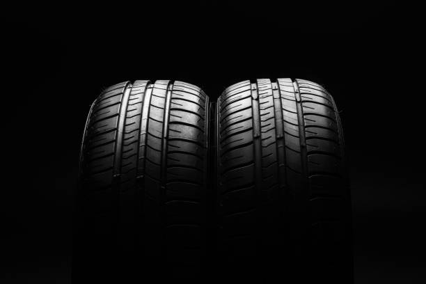 istock Summer fuel efficient car tires on black background 638767852