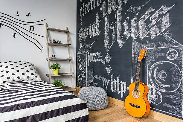 istock Unisex teenager interior with guitar 638768334