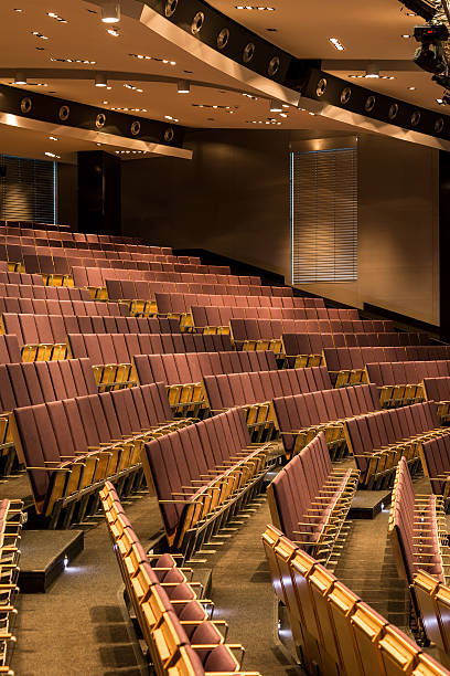 istock Spacious lecture room with wooden seats 638769638