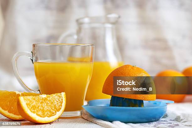 Glass Of Orange Juice Stock Photo - Download Image Now - Orange Juice, Backgrounds, Blue